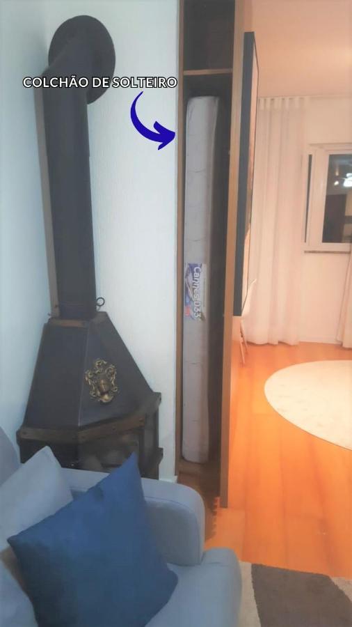 Em *